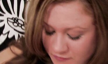 Hot MILF Wears Leather Shoes And Teases Her Man With A Footjob