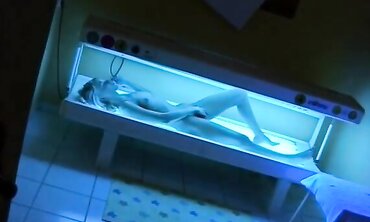 Lesbian MILFs Share Intimate Moments in Bed