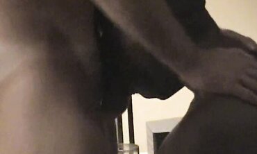 Bi-racial Couple Sharing Passionate Sex