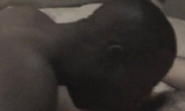 Bi-racial Couple Sharing Passionate Sex