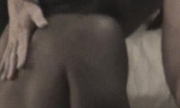 Bi-racial Couple Sharing Passionate Sex