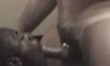 Bi-racial Couple Sharing Passionate Sex