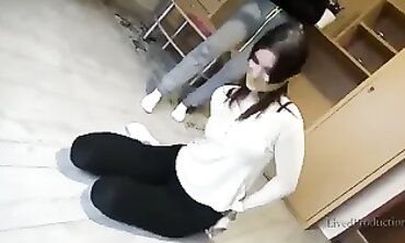 Stunning Brunette Bondage: Strapped, Ball-Gagged & Taped