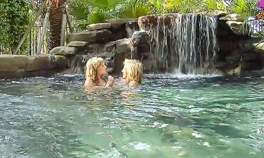 Kara Novak And Cheyenne Cooper Have Fun With A Dildo Outside