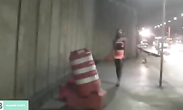 Dark-Haired Latina Flashing in City Traffic