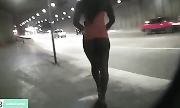 Dark-Haired Latina Flashing in City Traffic