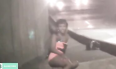 Dark-Haired Latina Flashing in City Traffic