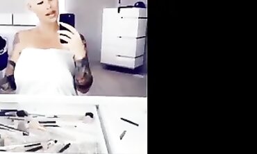 Amber Rose Shows Off Her Huge Natural Boobs