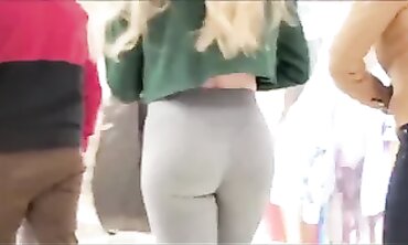 Voyeur Catches Blonde in Tights Squeezing Her Booty