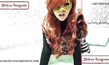 Redhead Latina Takes a Personalized Strap-On Tonguing Session