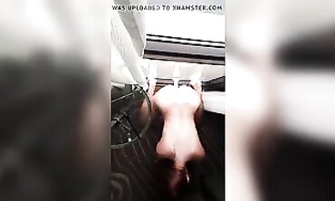 Redhead MILF Gets Fucked in Front of Motel Window