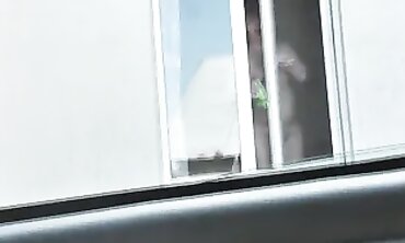 Russian Blonde Milf Washes Window Naked on Street