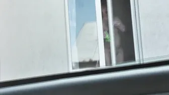 Russian Blonde Milf Washes Window Naked on Street