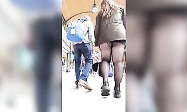 African MILF in Mini Skirt and Stockings Upskirt Surprise