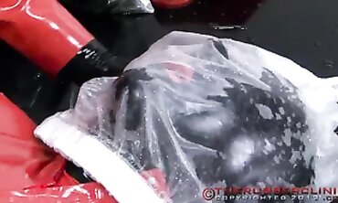 Red in Crimson Spandex Pissing on a Plinth Part 5