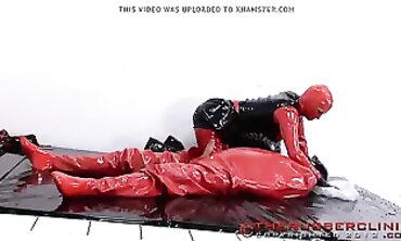 Red in Crimson Spandex Pissing on a Plinth Part 5