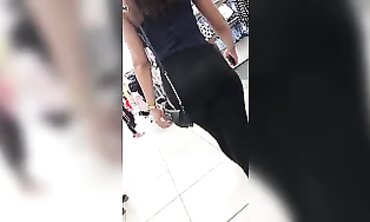 Ebony Beauty in Black Trousers with Visible G-Wire