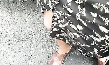86-Year-Old Black Woman in Lingerie at Parking Lot