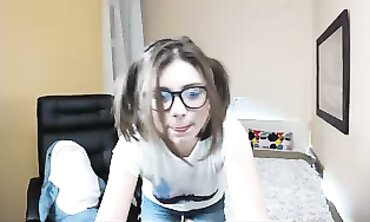 Solo Camgirl Teases Audience With Glasses and Pigtails