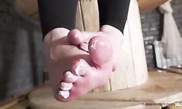 Sexy Bombshell Rubs Cream on Her Nude Feet