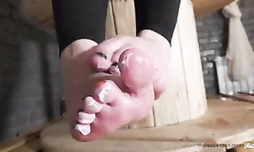 Sexy Bombshell Rubs Cream on Her Nude Feet