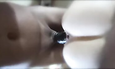 Mature Black Amateur in Latex Uses Vibrator at Home