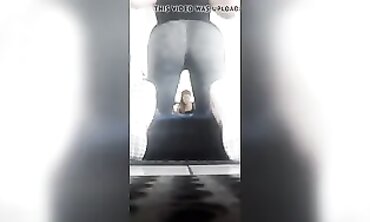 Nineteen-Year-Old Flexing Her Big Ass in Gray Leggings at the Gym