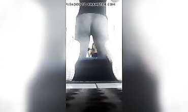 Nineteen-Year-Old Flexing Her Big Ass in Gray Leggings at the Gym