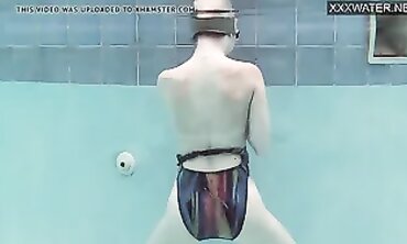Emie Amfibia Swims and Orgasms in the Pool