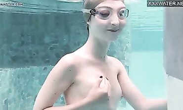 Emie Amfibia Swims and Orgasms in the Pool