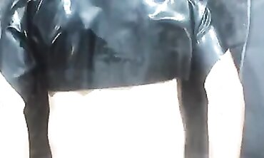 Latex Pegging Purity 2: Brunette in Rubber Chastity