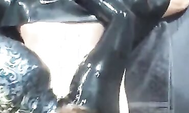 Latex Pegging Purity 2: Brunette in Rubber Chastity