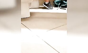 College Girl Takes a Leak in the School Restroom