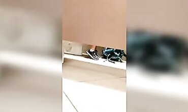 College Girl Takes a Leak in the School Restroom