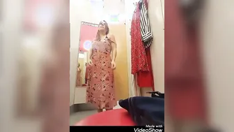 Redhead MILF Striptease in Clothing Store