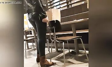 Sexy Cougar in Dark Green Leather Leggings with Cameltoe
