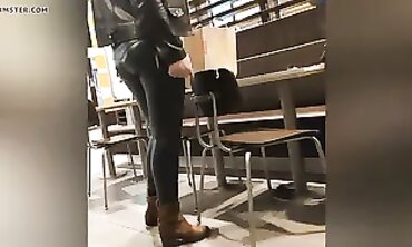 Sexy Cougar in Dark Green Leather Leggings with Cameltoe