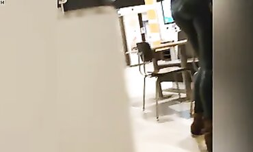 Sexy Cougar in Dark Green Leather Leggings with Cameltoe