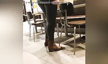 Sexy Cougar in Dark Green Leather Leggings with Cameltoe