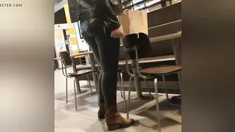 Sexy Cougar in Dark Green Leather Leggings with Cameltoe
