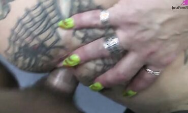 Heavily Tattooed And Pierced Biker Chick Black Widow Sucks And Fucks