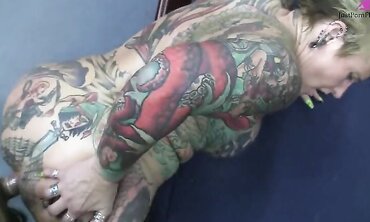 Heavily Tattooed And Pierced Biker Chick Black Widow Sucks And Fucks