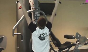 Girl with big tits goes to gym and gets helped with workout.  Repays the trainer with a blowjob by the weights and takes cum shot on her tits.