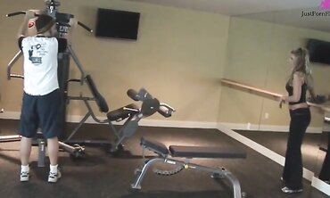 Girl with big tits goes to gym and gets helped with workout.  Repays the trainer with a blowjob by the weights and takes cum shot on her tits.