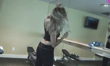 Girl with big tits goes to gym and gets helped with workout.  Repays the trainer with a blowjob by the weights and takes cum shot on her tits.
