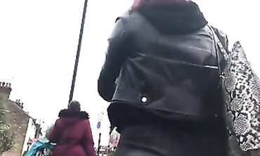 Redheaded Babe Shows Off Her Cute Ass in Tight Jeans