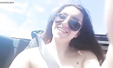 Beautiful British Woman in Sports Car