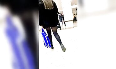 Nice Legs in a Mini-Skirt and Stockings