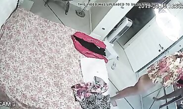 Honey MILF Caught on Hidden Cam Changing in Apartment
