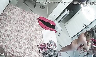 Honey MILF Caught on Hidden Cam Changing in Apartment